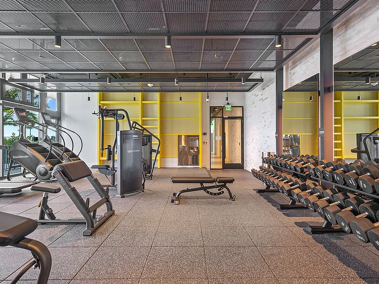 24/7 fitness center with cardio and strength training equipment