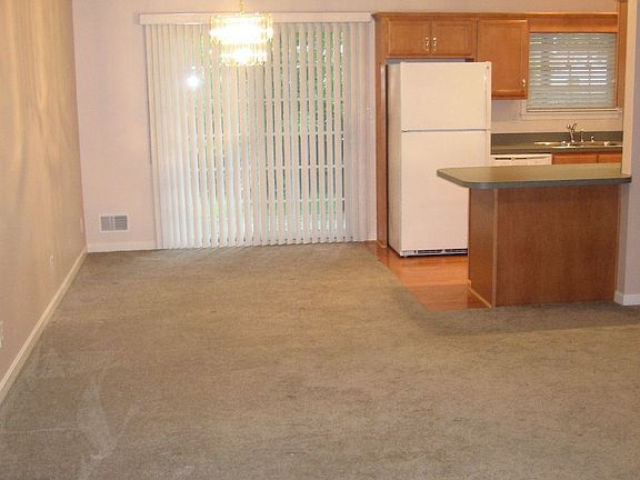 Living room into dining area & out onto the deck