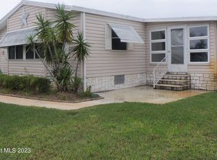 914 Cypress St, Barefoot Bay, FL 32976