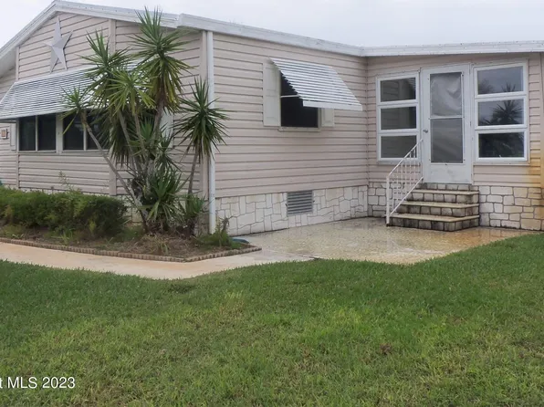 914 Cypress St, Barefoot Bay, FL 32976