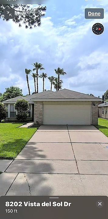Front driveway into 2 Garage