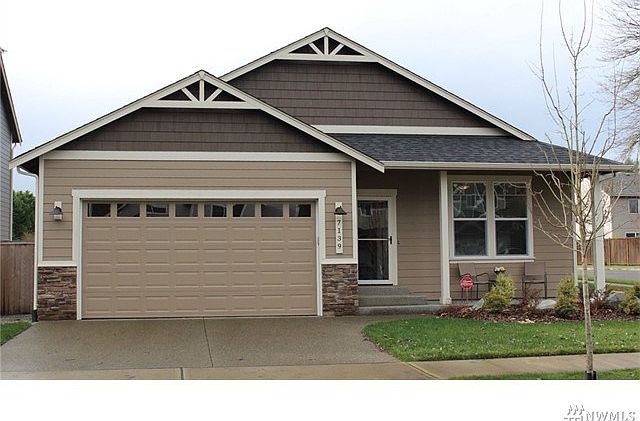 Attractive Rambler in Tumwater with all the bells and whistles...Vaulted great room with lots of natural light, hardwood floors, slab granite kitchen counters, stainless appliances, painted trim, craftsman style interior doors, 5 piece master bath, AC, al