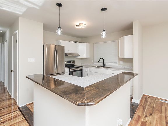 5th image of 8210 E 37th Pl