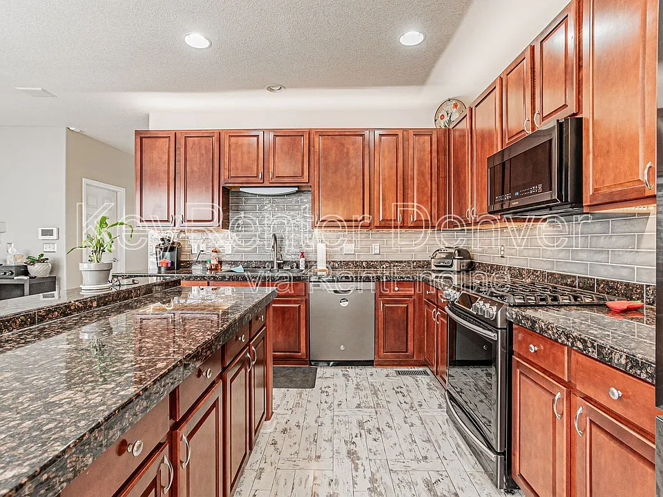 15612 E 96th Way #1A