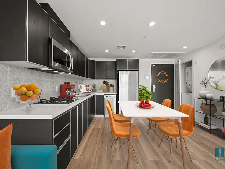 Open-Concept Kitchen with Stainless-Steel Appliances and Ample Cabinet Storage - Peach Floor Plan