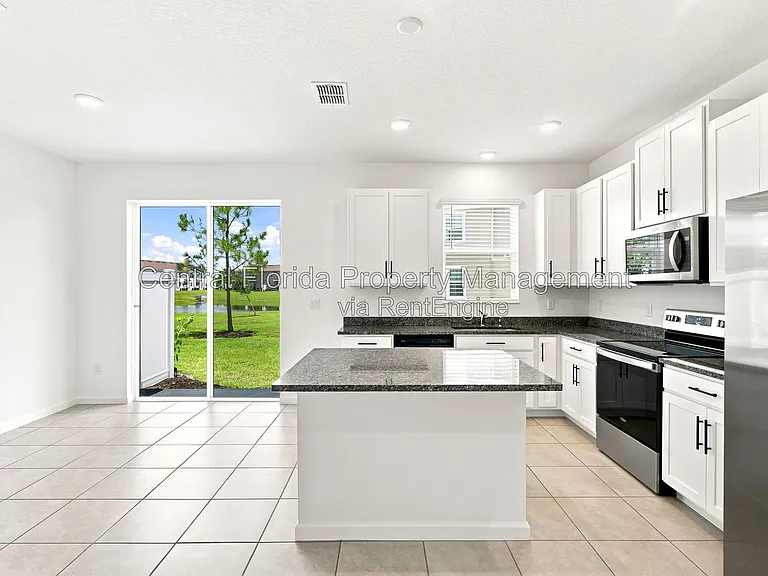 865 Spring Palms Loop #1 — Photo 17