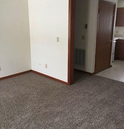 living room into kitchen, hallway to half bath and laundry room, and also large closet