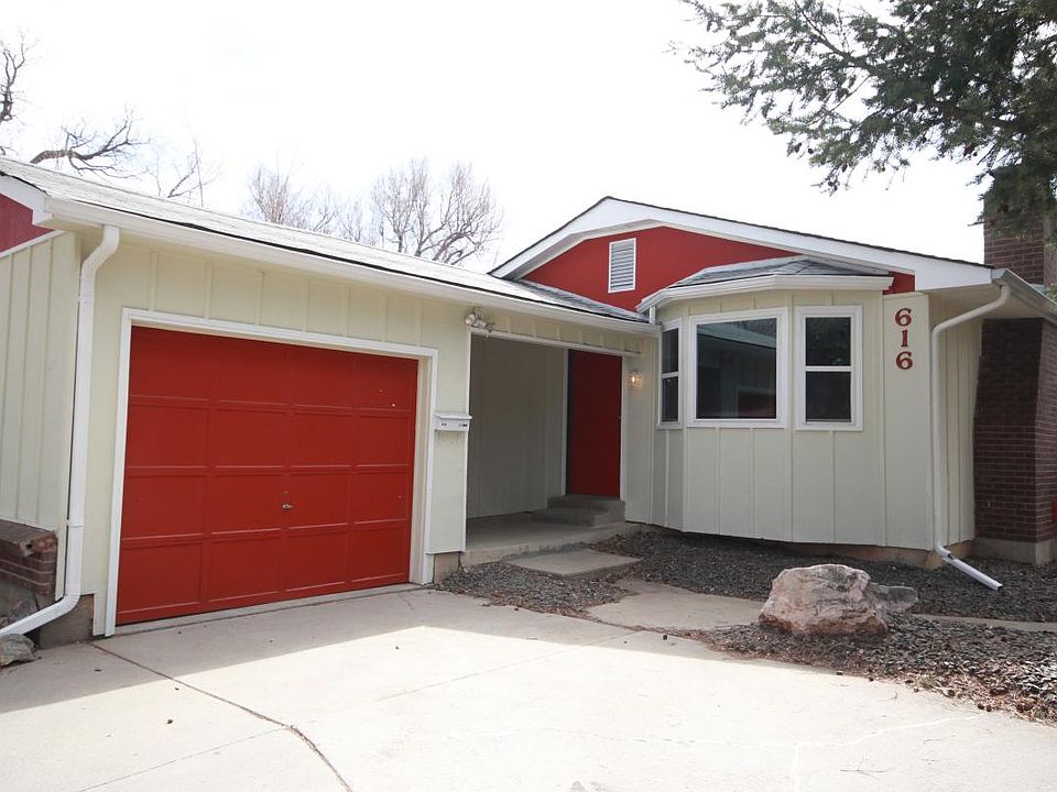 Charming exterior with attached garage