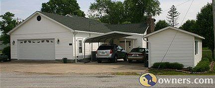 Attached garage, carport & shed
