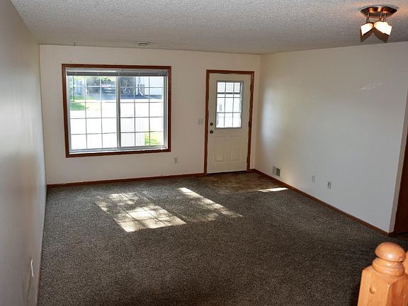 Great natural light from front window overlooking living/dining area.
