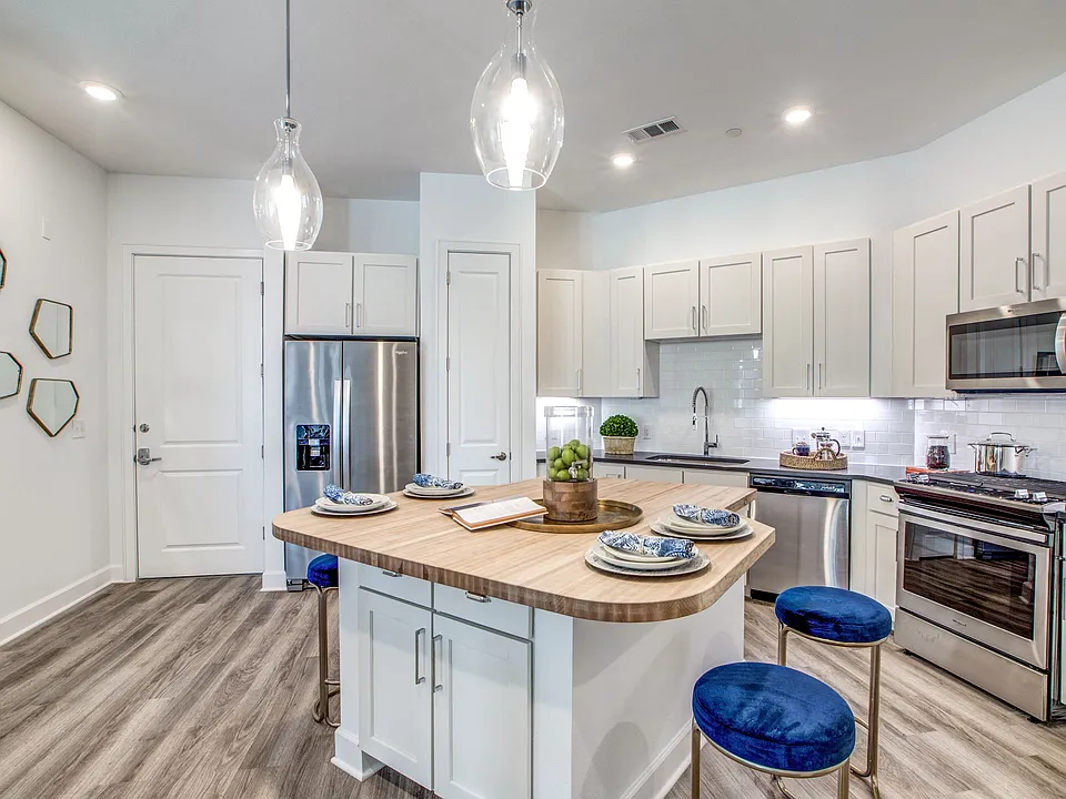 Two Bedroom Model with Butcher Block Islands