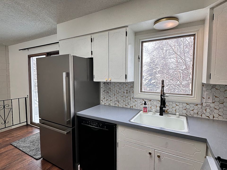 Kitchen sink overlooking large deck