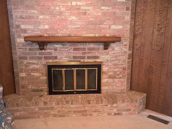 Fireplace, brick to ceiling