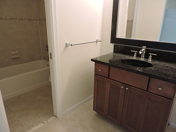 second bathroom with tub/shower combo