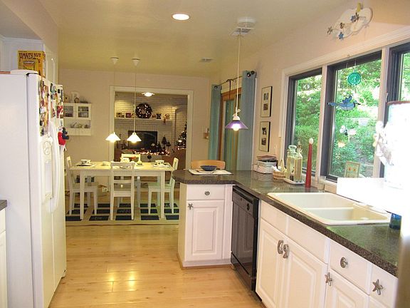 Main house kitchen/breakfast area connected to family room