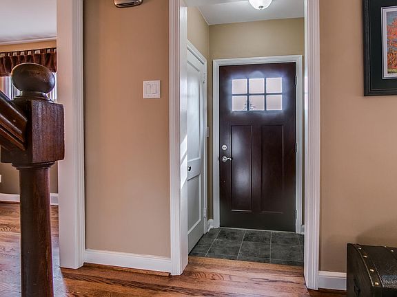 Charming new front door leads into the vestible