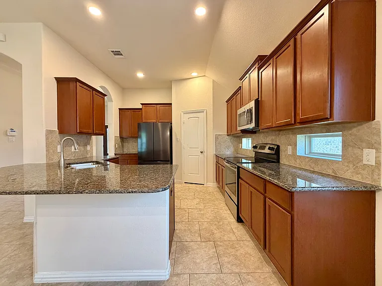 908 Arvada Dr — Photo 11