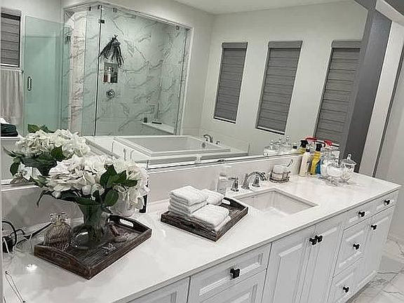 Stunning Master Bathroom w/ Quartz Countertops.