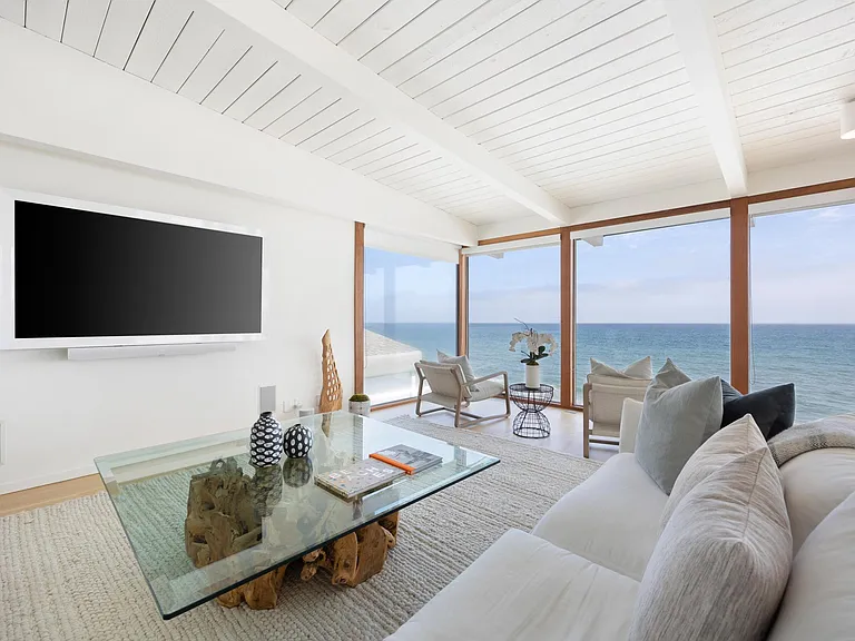 Watch the stunning view or your favorite movie from the comfortable living room couch.