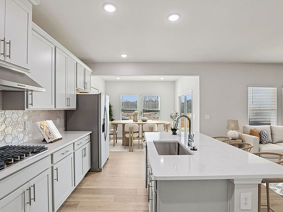 Kitchen in the Dallas floorplan at a Meritage Homes community in Garner, NC.