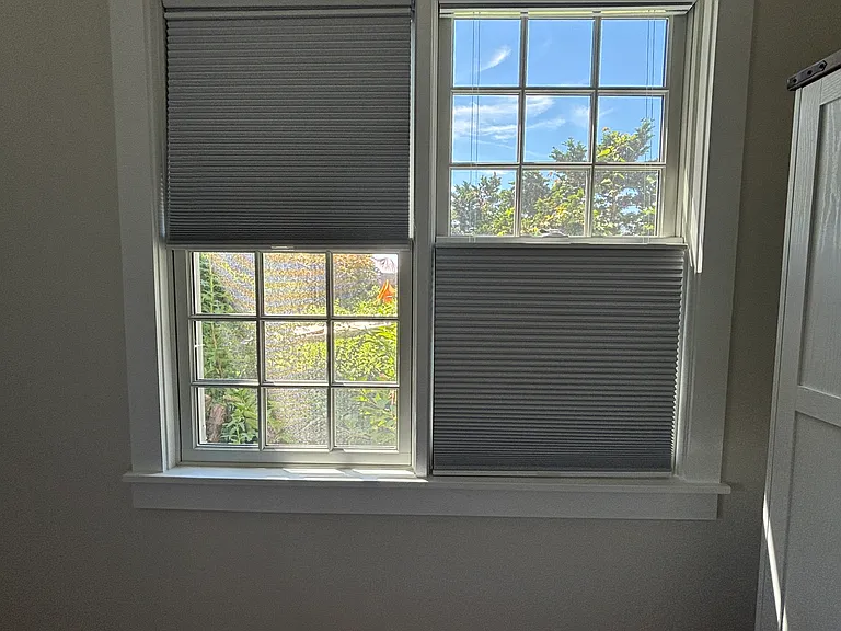 Downstairs: front bedroom, tope down bottom up shades in both bedrooms