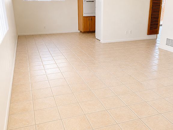 Living room facing kitchen