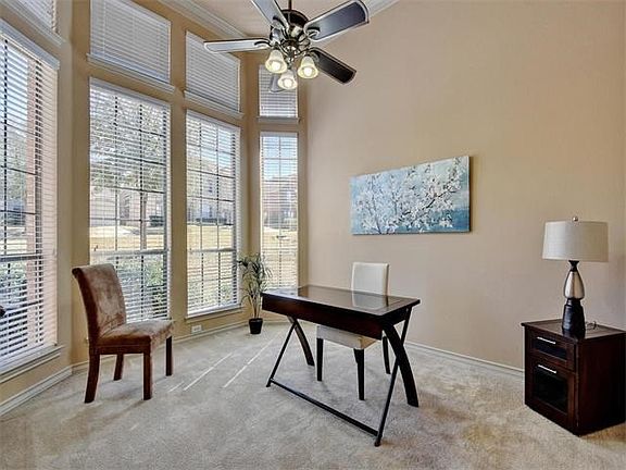 A dedicated study overlooks the front yard and is a private space to complete work and projects.