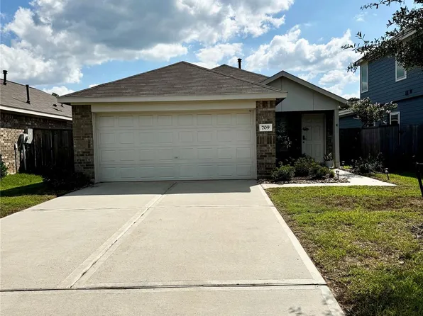 709 Roaring Falls Dr, Willis, TX 77378