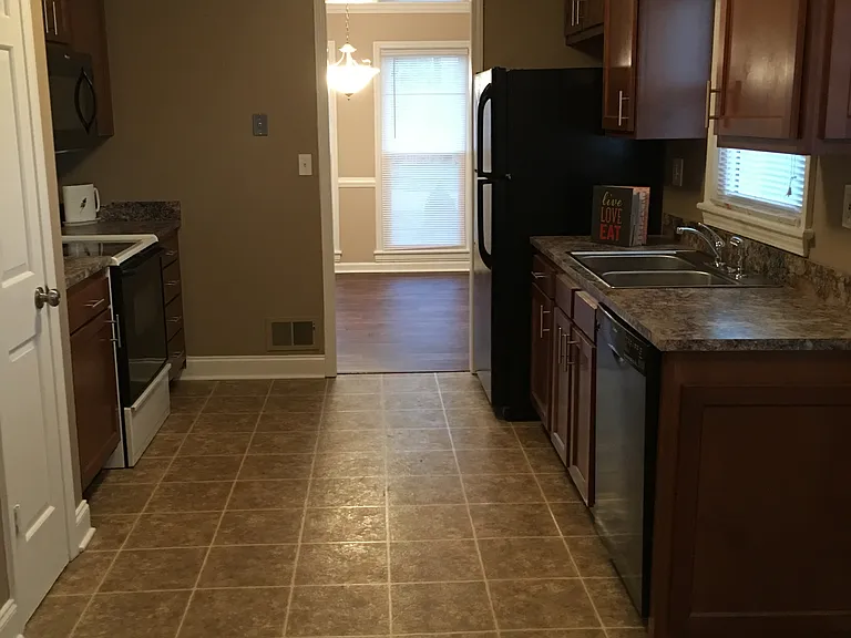 stove, frig, microwave and dishwasher included