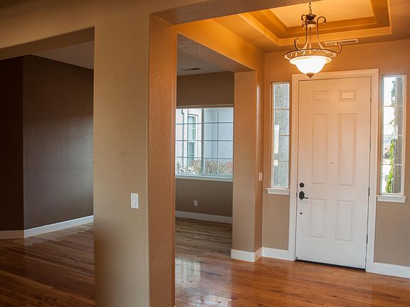 front entryway with formal dining room