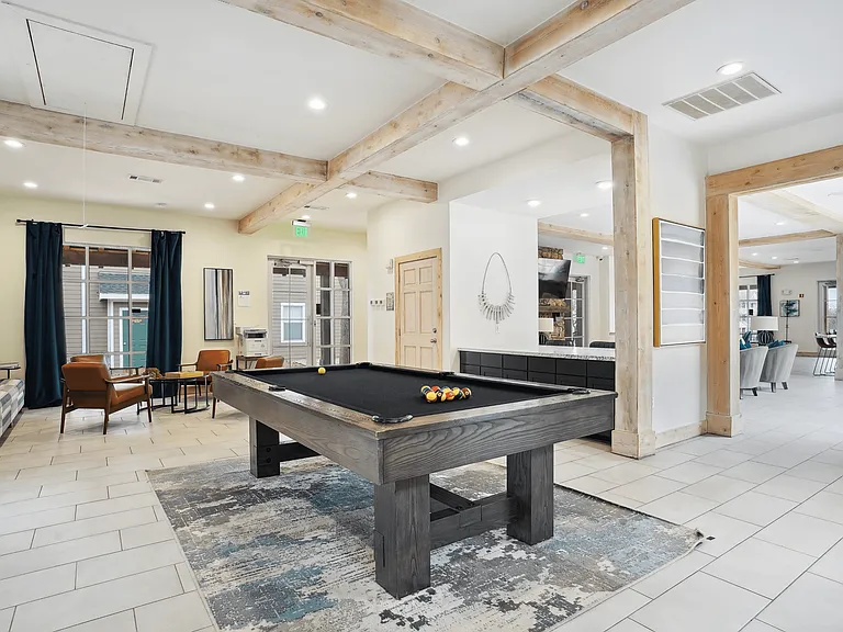 Resident lounge with billiards table and entertainment kitchen