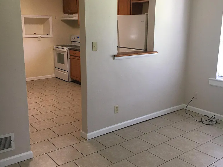 Dining room looking into kitchen
