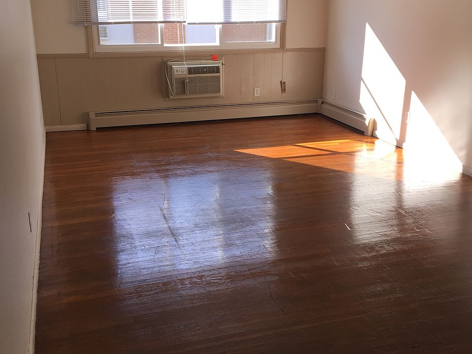 Living Room with built in A/C in the wall