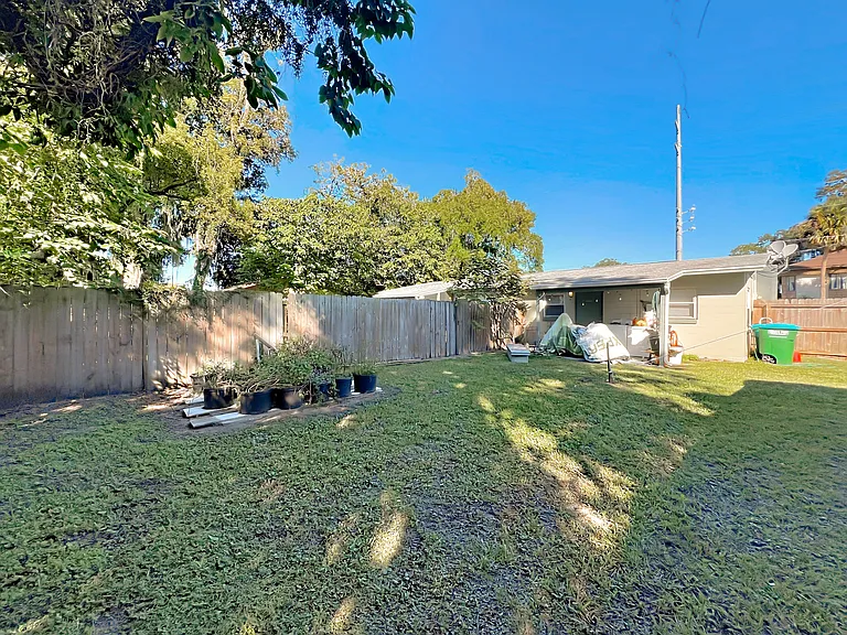 Back yard lawn care is included in the monthly rent.
