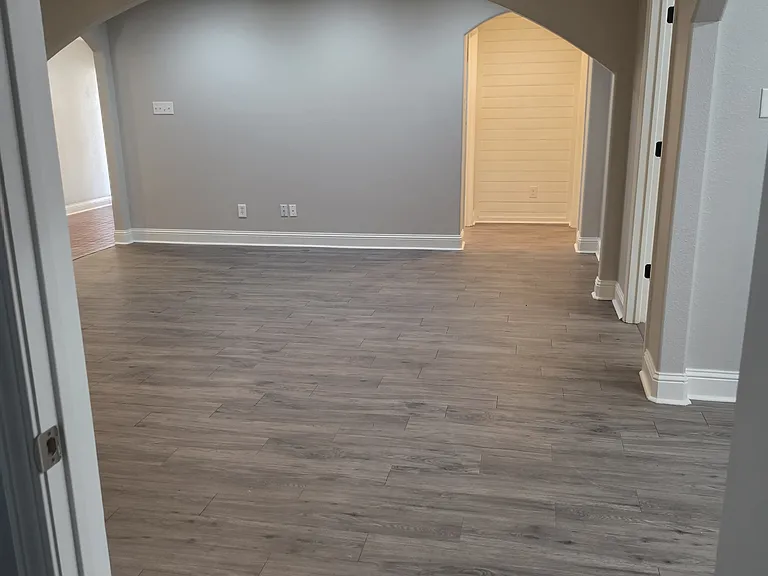 View from doorway in master bedroom looking into the living room