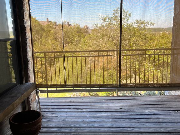 West facing outdoor living, has string lights, adjustable screen for light/privacy