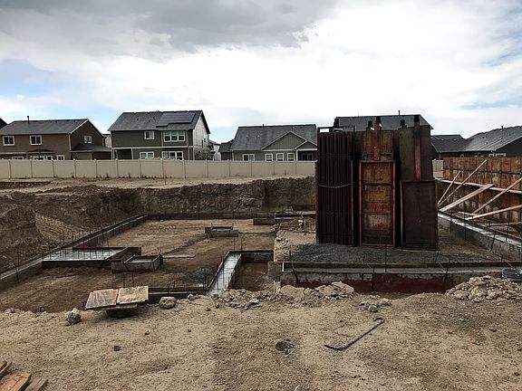 Foundation underway for the newest Belford. Photo of home under construction