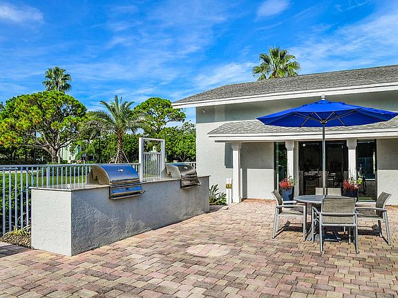 Poolside patio with grills