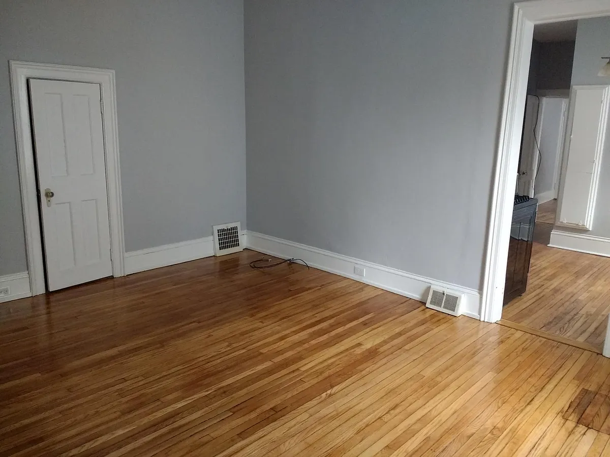 Living room looking into kitchen (right side of photo) - 45 Ford Ave