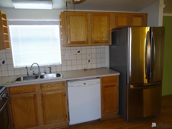 3rd image of 13657 & 13647 E 51st Ln