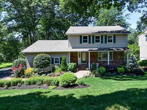 front of house with covered porch entrance