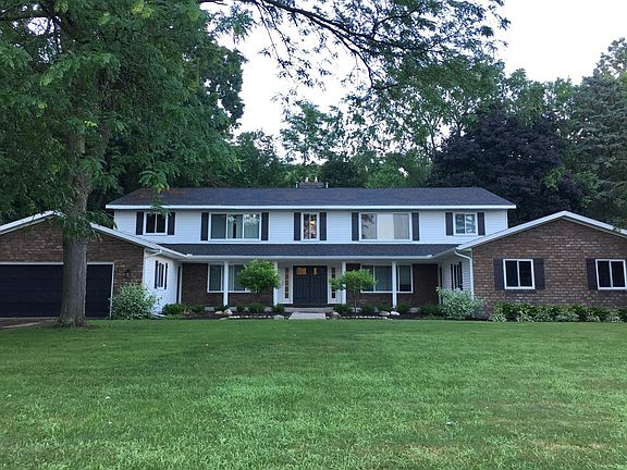 The unit for lease is the main floor left half and includes 1 stall of the left side garage.