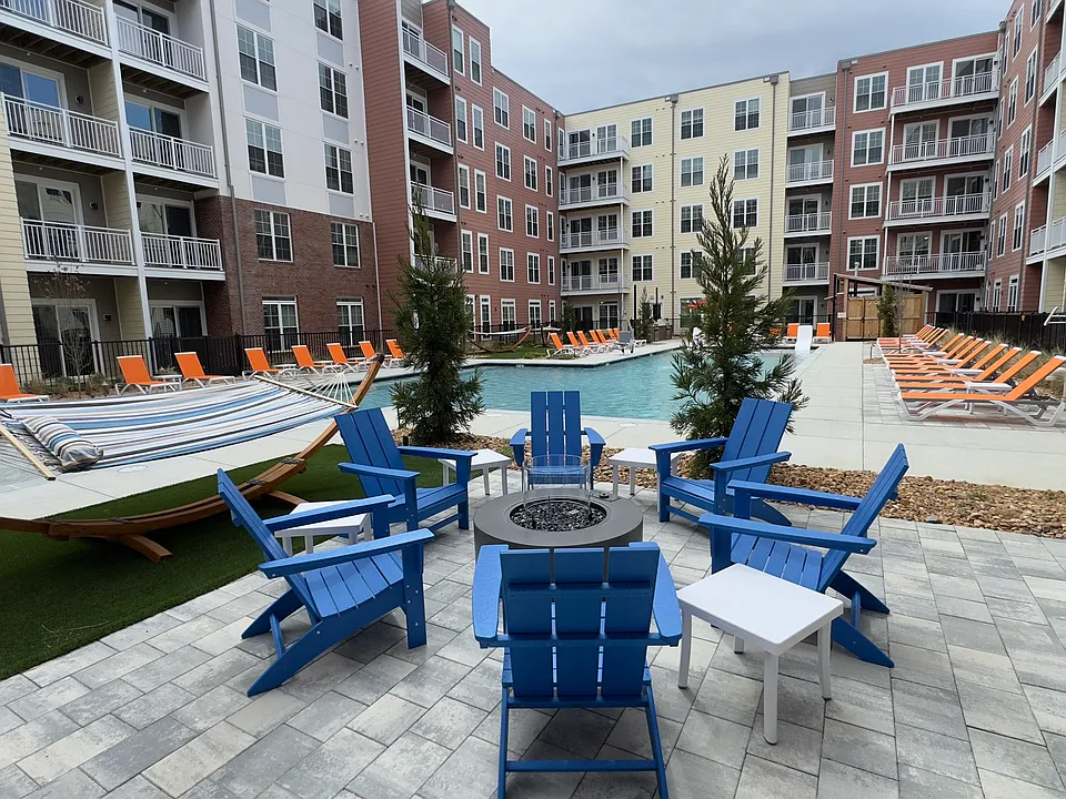 Triton's Oasis: Poolside Courtyard Retreat