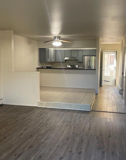 Dining and Kitchen area from living room. Also back door access =