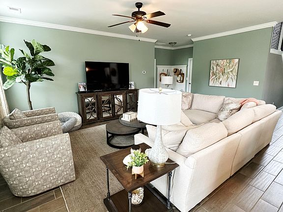 Living space with adorable drop zone by garage entrance