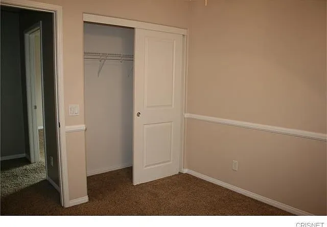 Bedroom 2 upstairs with closet
