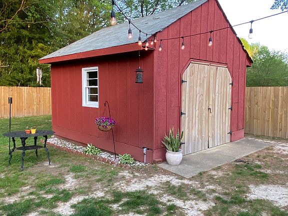 Outdoor shed with electricity