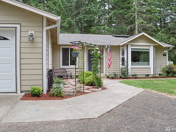 CHARMING COUNTRY WALK WAY WITH TRELLIS AND SITTING AREA  GREET YOU.......SO TRANQUIL.........