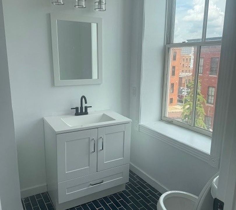 2nd image of 936 N Calvert St APT 12