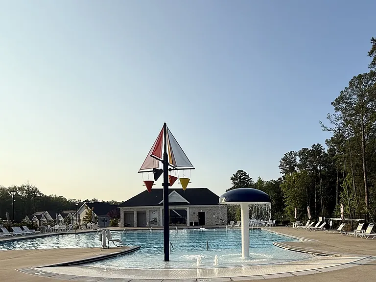 Resort style pool and kids splash area.